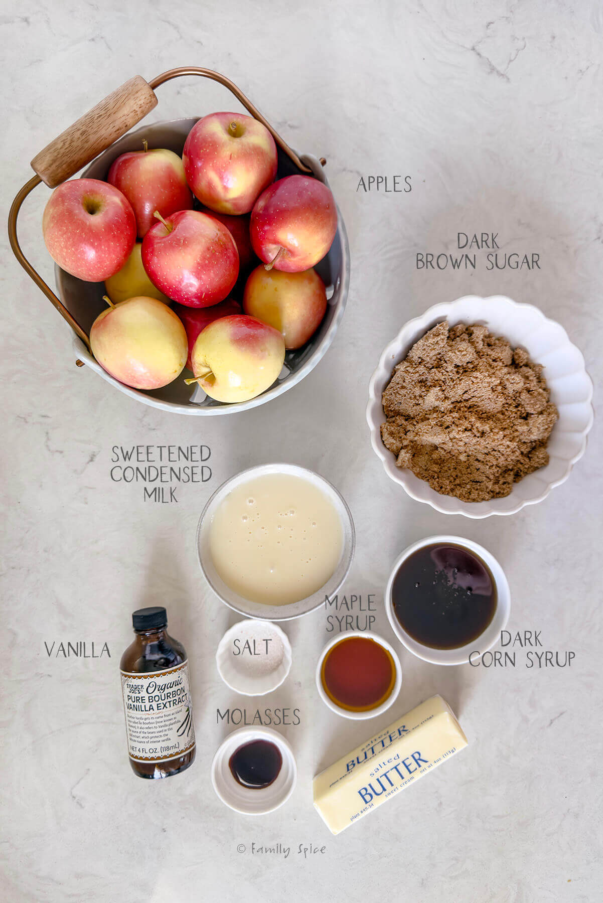 Ingredients labeled and needed to make homemade caramel apples.
