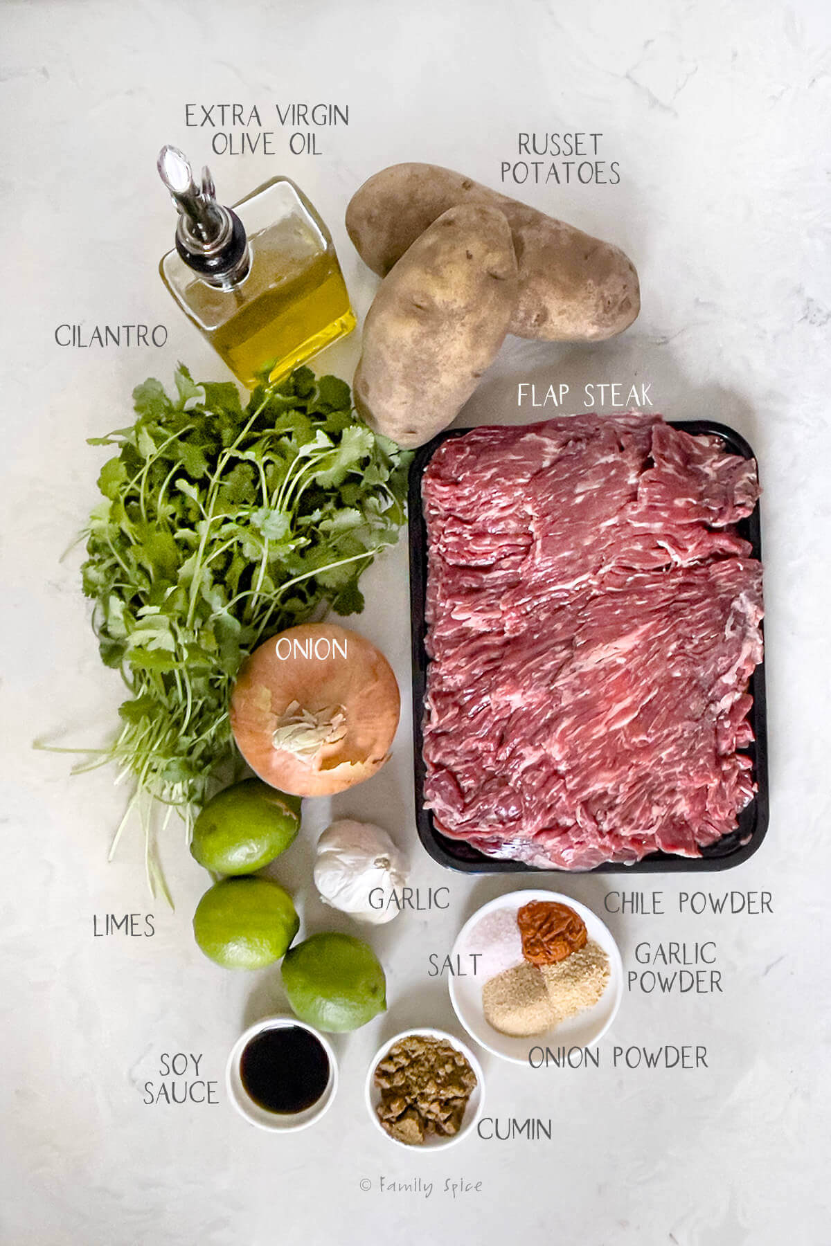 Ingredients labeled and needed to make carne asada fries.