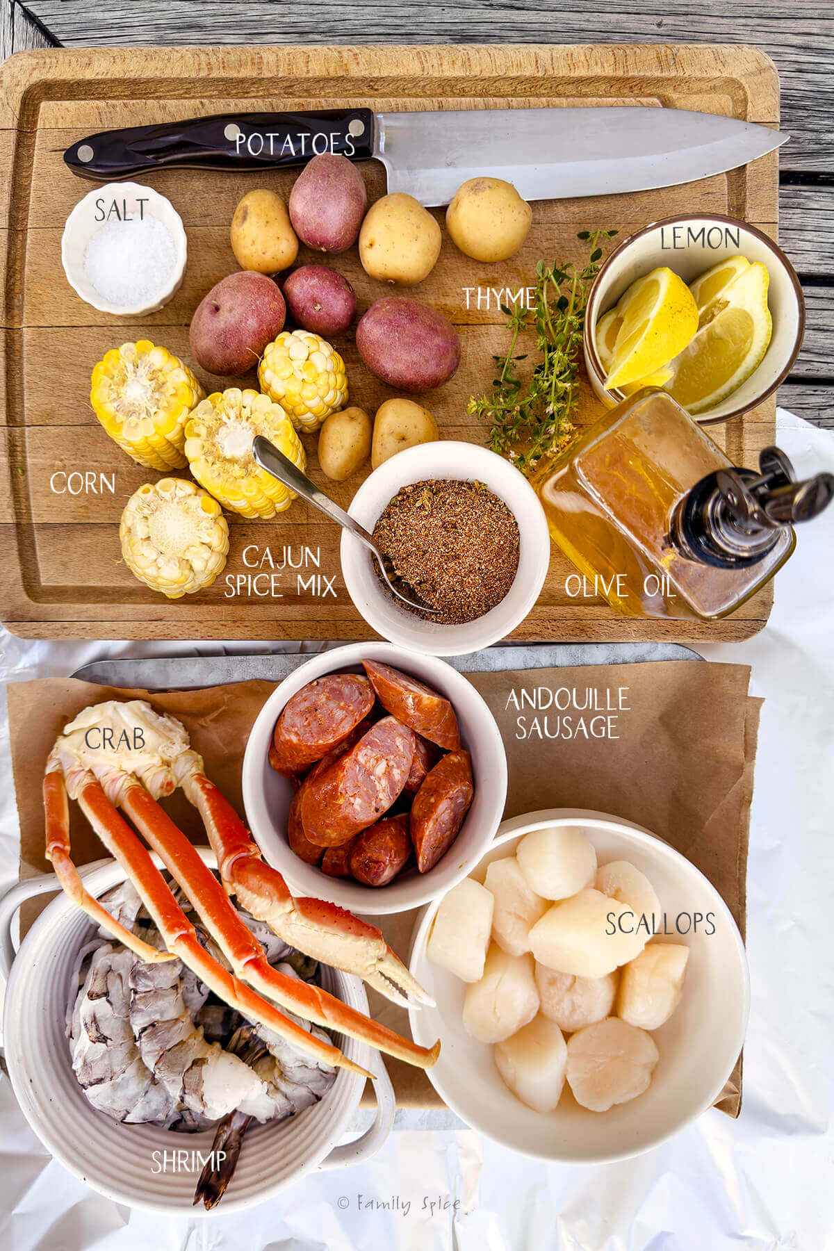 ingredients labeled and needed to make seafood foil packet dinner.
