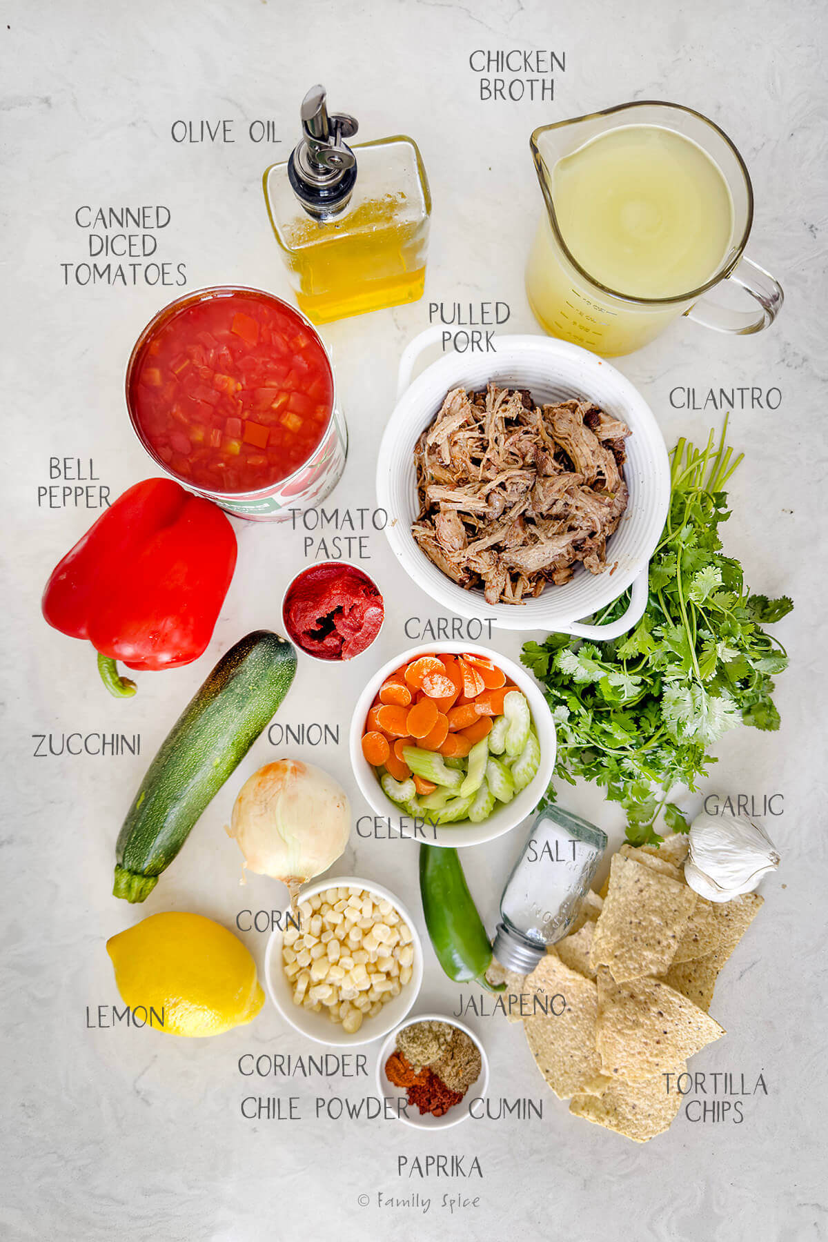 Ingredients labeled and needed to make pulled pork tortilla soup.