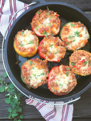 Cast iron Dutch oven filled with Italian stuffed peppers