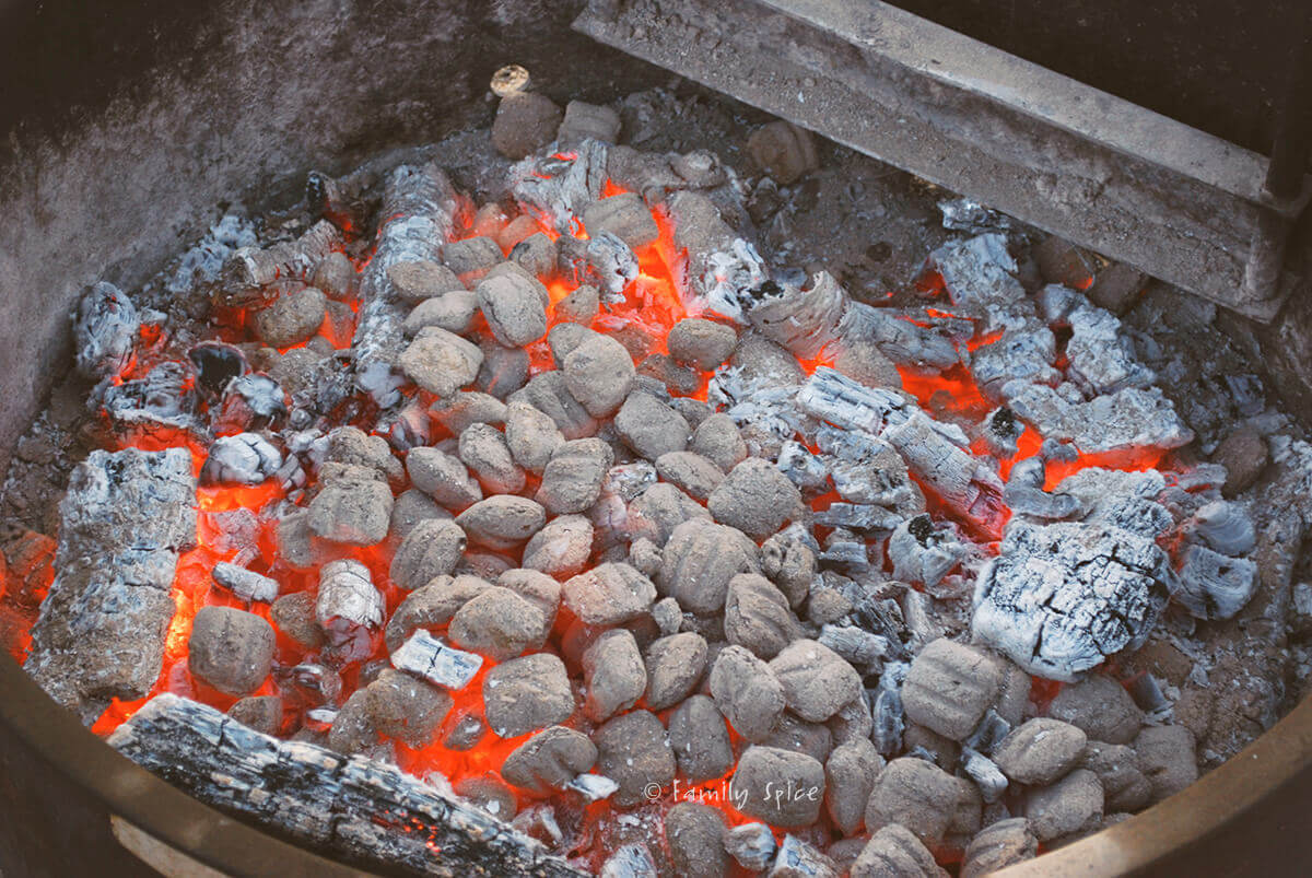 Hot coals in a campfire ring
