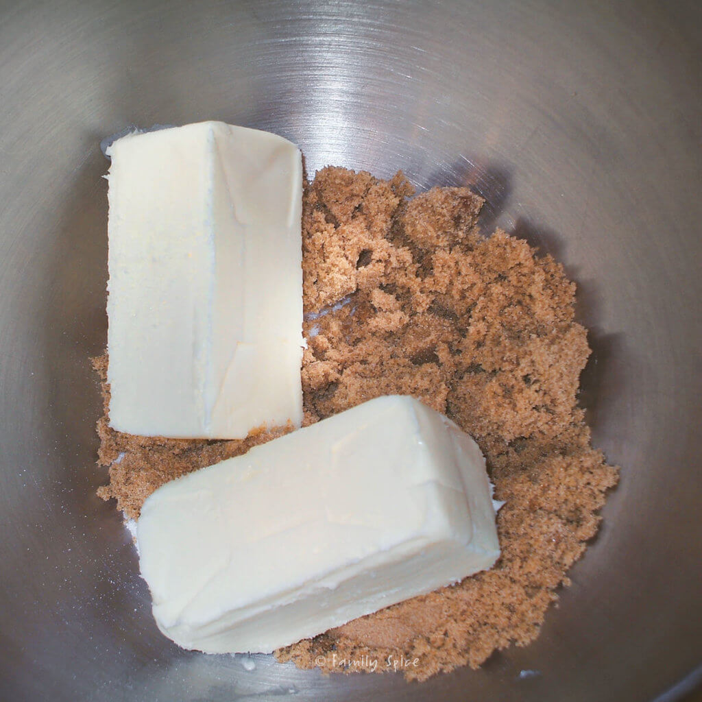 Softened butter in a mixing bowl with brown sugar