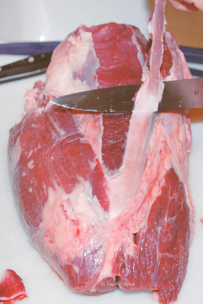 Removing the silver skin from the beef tenderloin