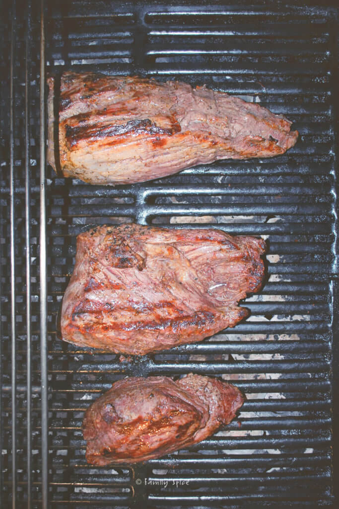 Beef tenderloins cooking on the grill