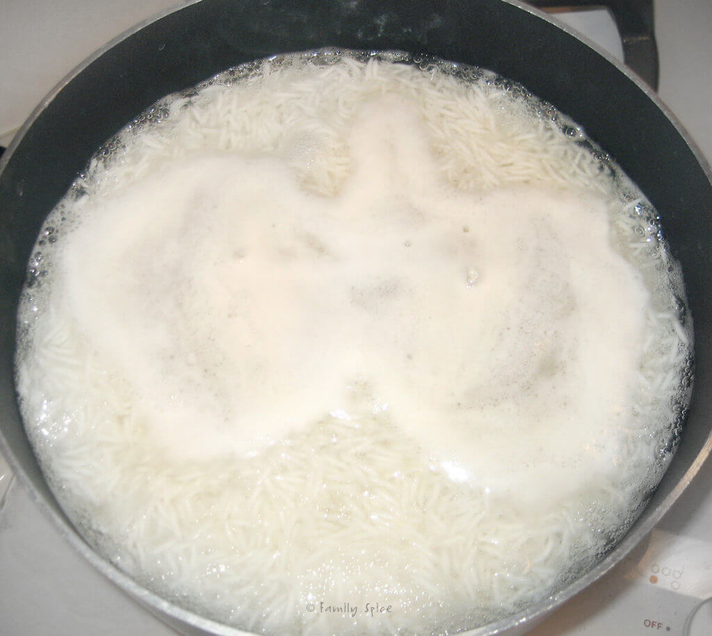 Parboiling basmati rice in a pot
