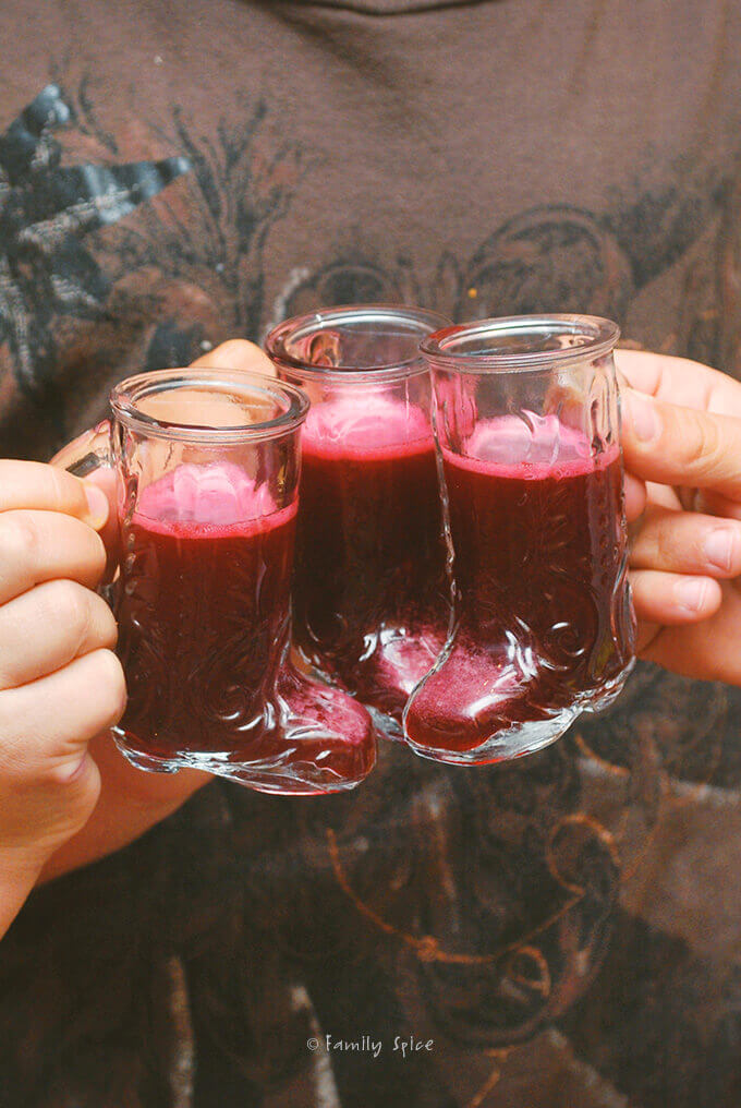 Kids drinking pomegranate juice by FamilySpice.com