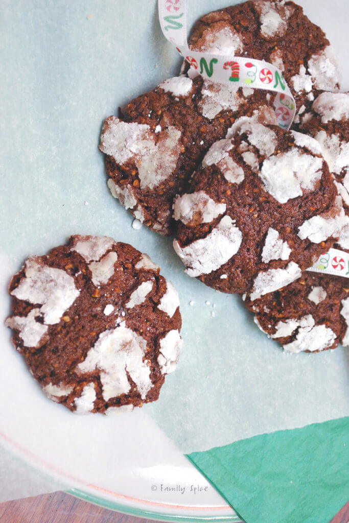 Almond chocolate crackle cookies on a white dish