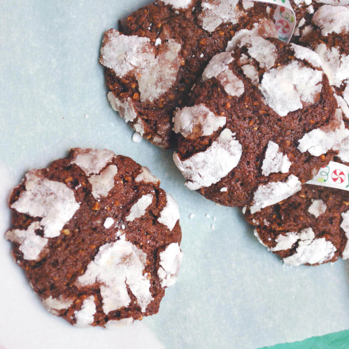 Almond chocolate crinkle cookies on a white dish
