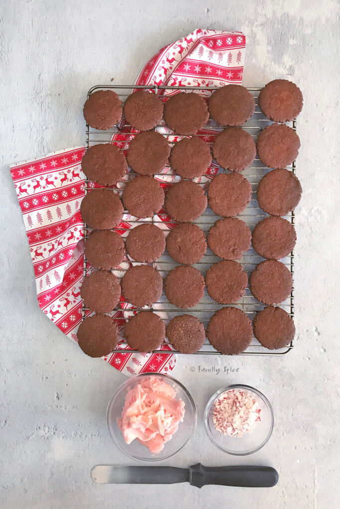 Chocolate sandwich cookies cooling on a baking sheet