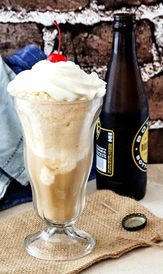 A creamy root beer float in a tall glass by PastryChefOnline.com