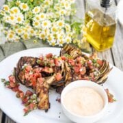 Pinterest image for chile lime grilled artichokes.