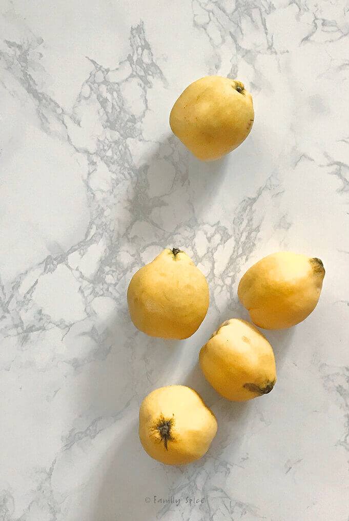 Peeling Quince on White Marble by FamilySpice.com