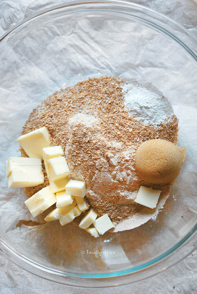 Butter and dry ingredients in a bowl to make yogurt whole wheat scones by FamilySpice.com