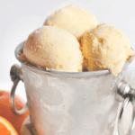 Pinterest image for homemade orange sherbert in a pewter container by FamilySpice.com