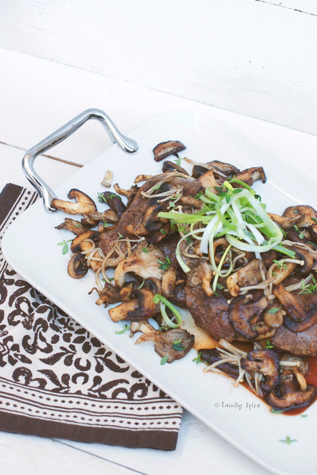 Grilled Flank Steak with Garlic and Wild Mushrooms - Family Spice