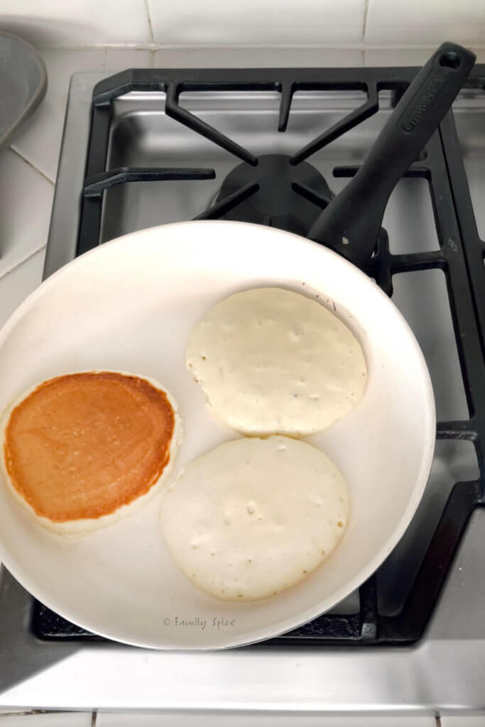 Cooking yogurt pancakes in a non-stick pan on the stove