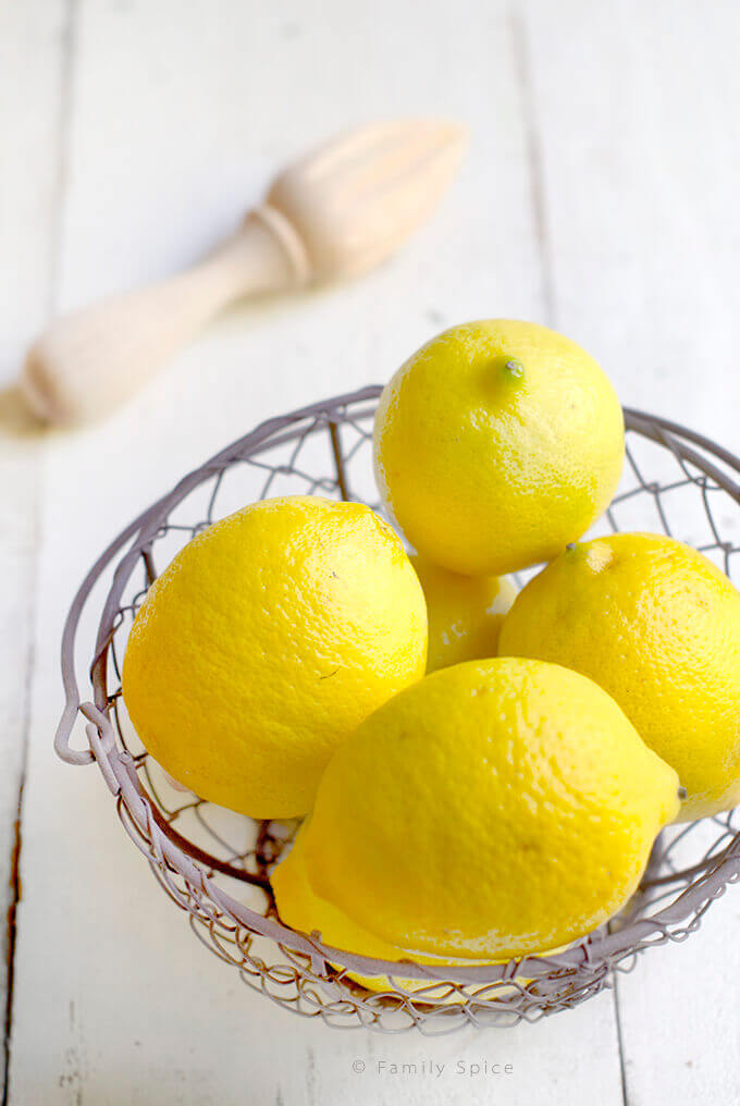 Lemons in a wire basket by FamilySpice.com