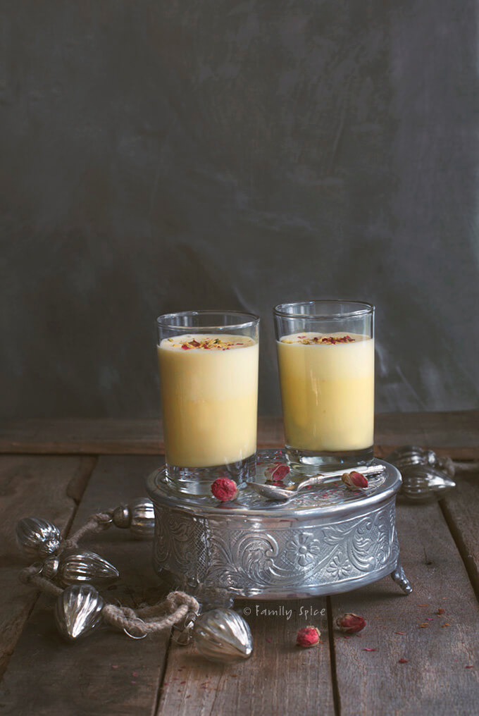 2 Glasses of Persian Eggnog with Saffron and Rosewater in a Dark Backdrop by Familyspice.com
