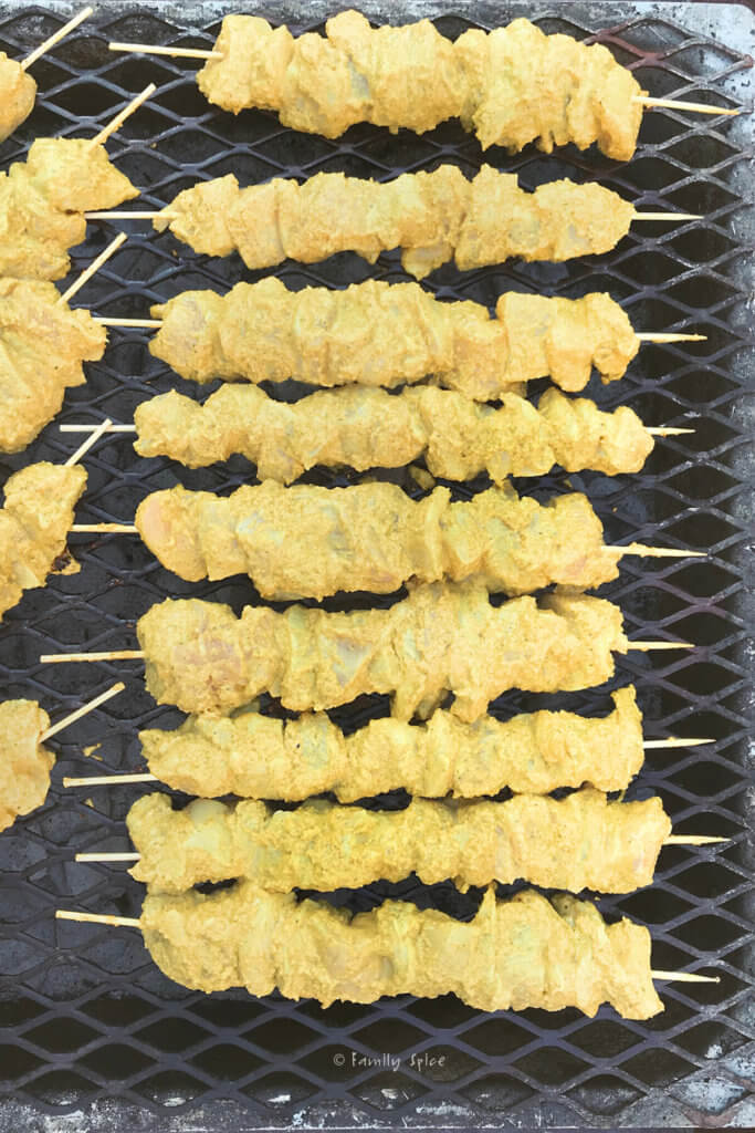 Chicken shawarma kebabs over a grill