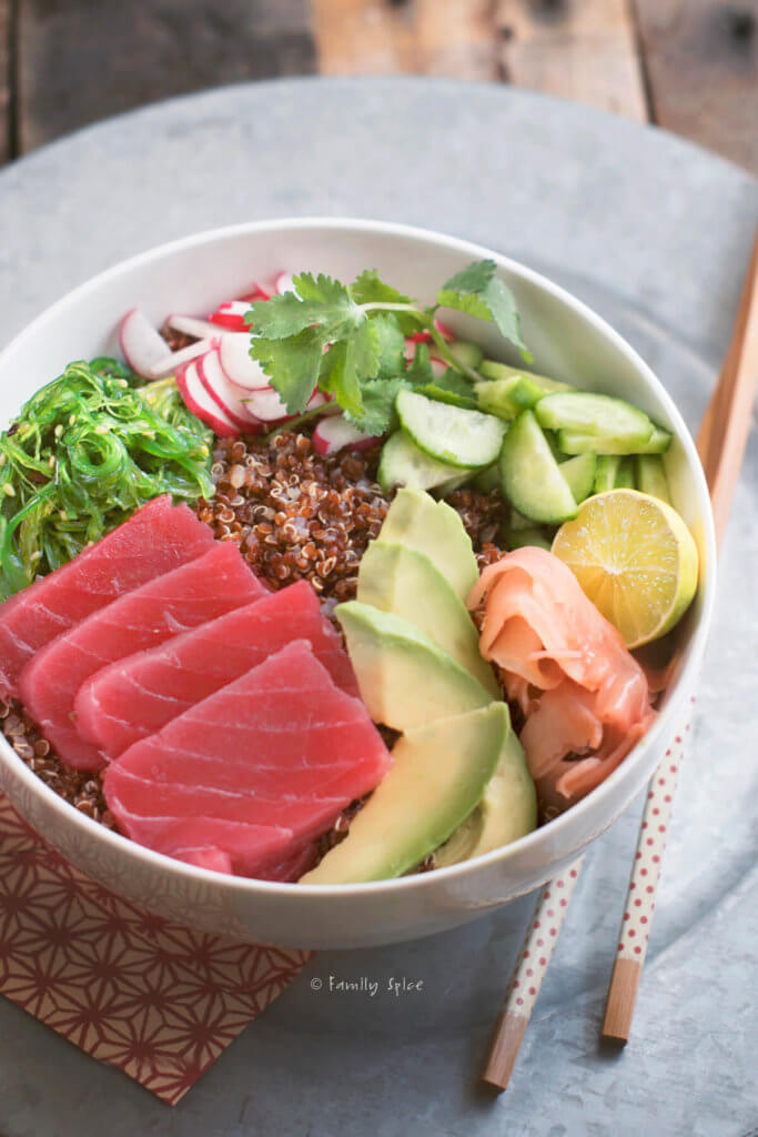Closeup of an ahi poke bowl with quinoa