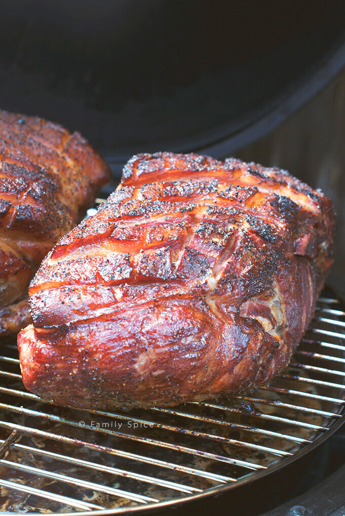 Smoked pork roast on the grill by FamilySpice.com