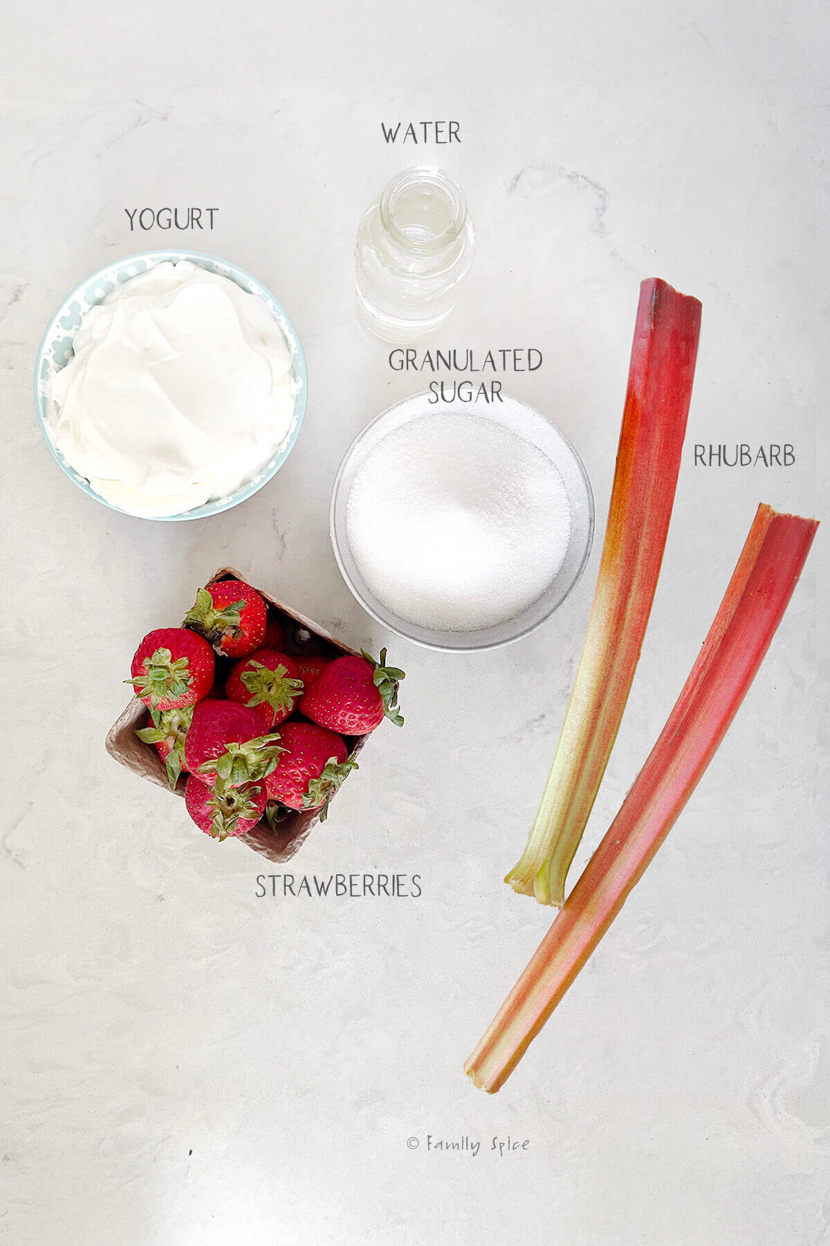 Ingredients labeled and needed to make strawberry rhubarb creamsicles.