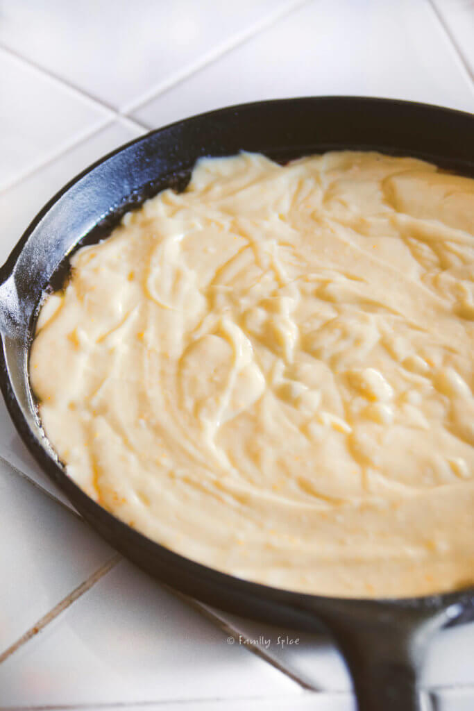 Cake batter in a cast iron skillet
