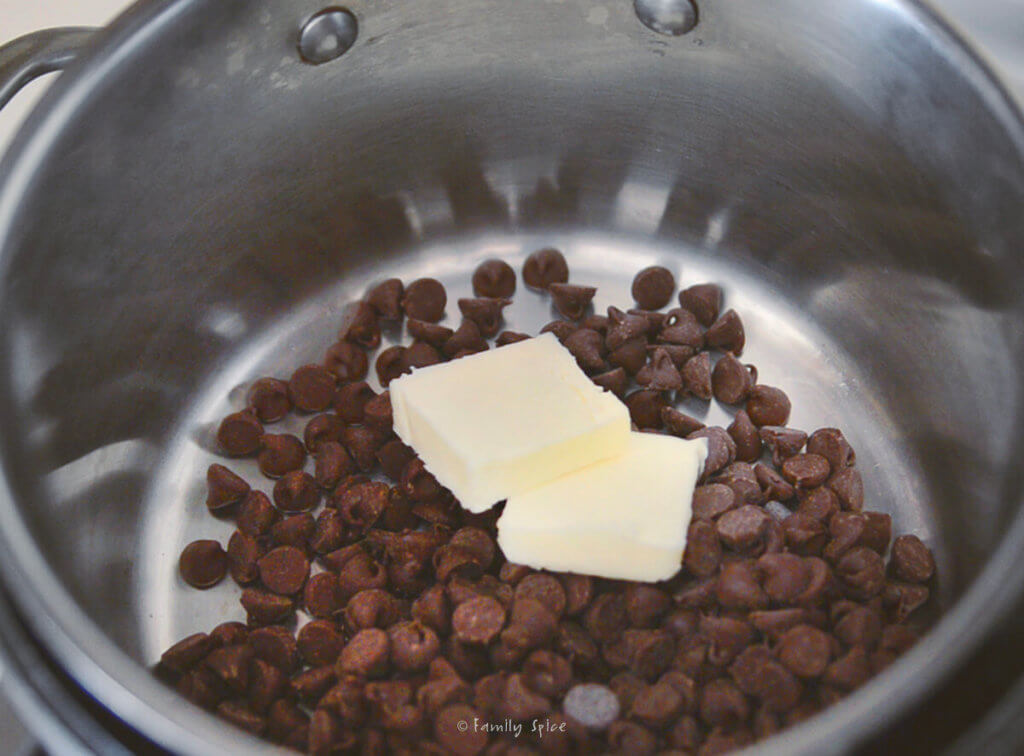 Chocolate chips and butter in a double boiler waiting to be melted