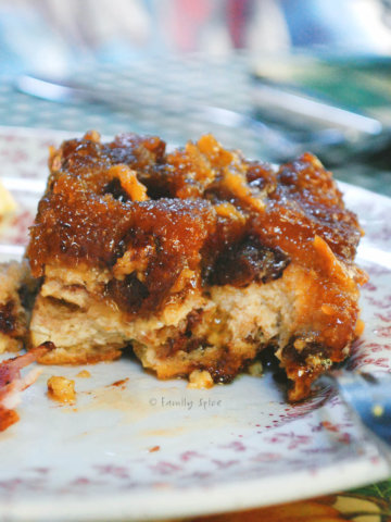 A slice of croissant bread pudding on a plate