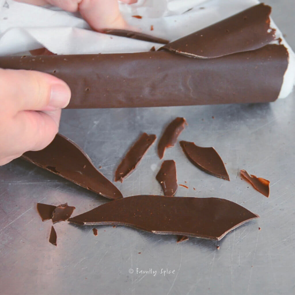 Unrolling parchment paper to make chocolate shards