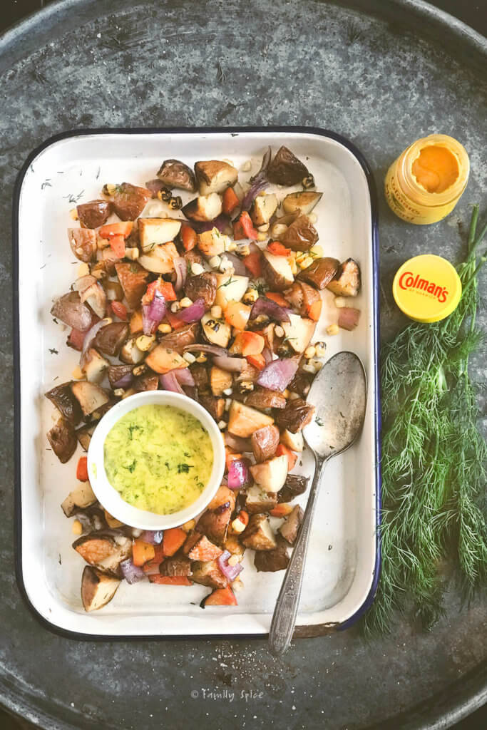 Grilled chopped vegetables with mustard dressing in a bowl to prepare potato salad