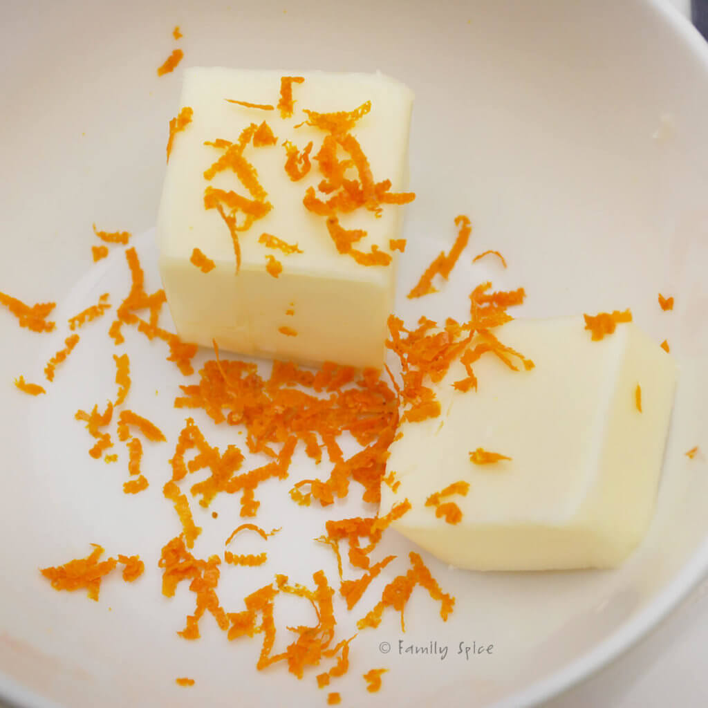 a bowl with butter and orange zest