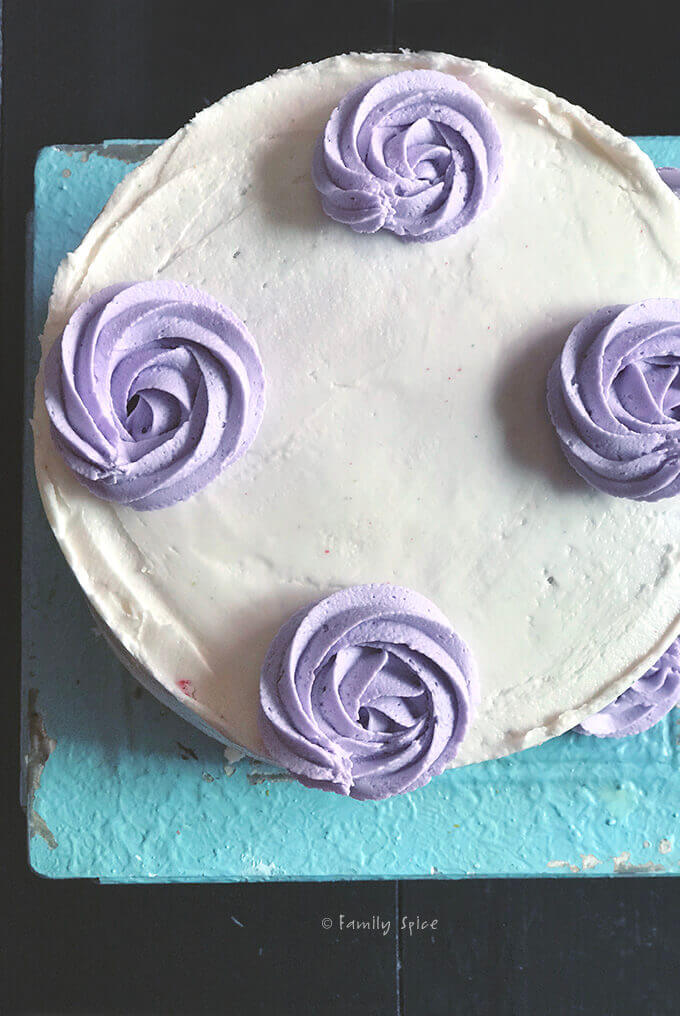 Piping purple swirls for the mane of my unicorn cake by FamilySpice.com