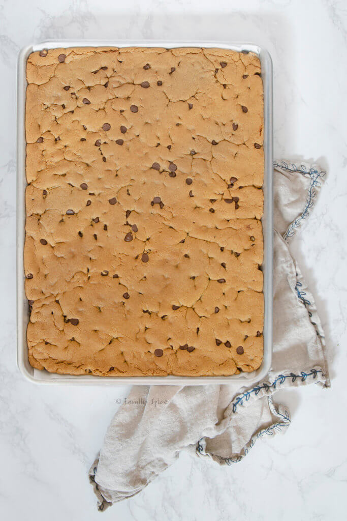 Chocolate chip cookie dough baked into a sheet pan