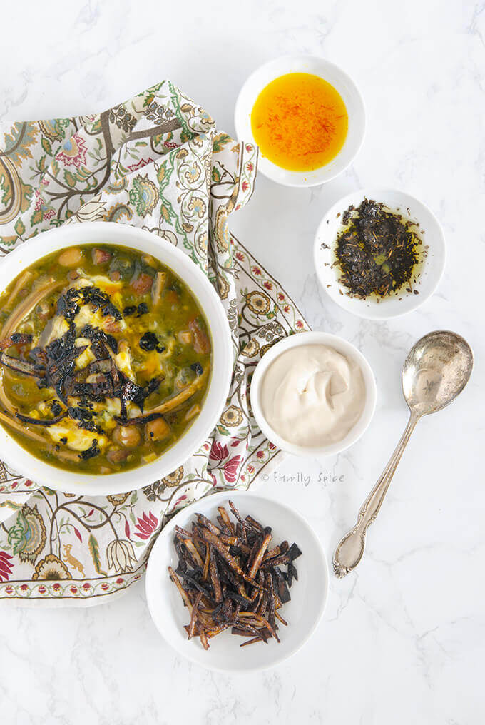 Closeup shot of a bowl of instant pot ash reshteh (Persian noodle soup) by FamilySpice.com