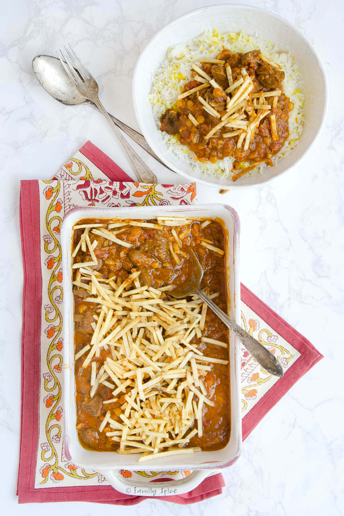 Persian khoresh gheymeh topped with shoestring potatoes