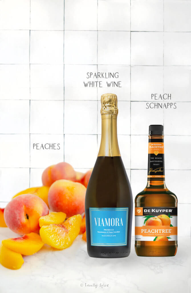 Ingredients labeled and needed to make sparkling peach sangria