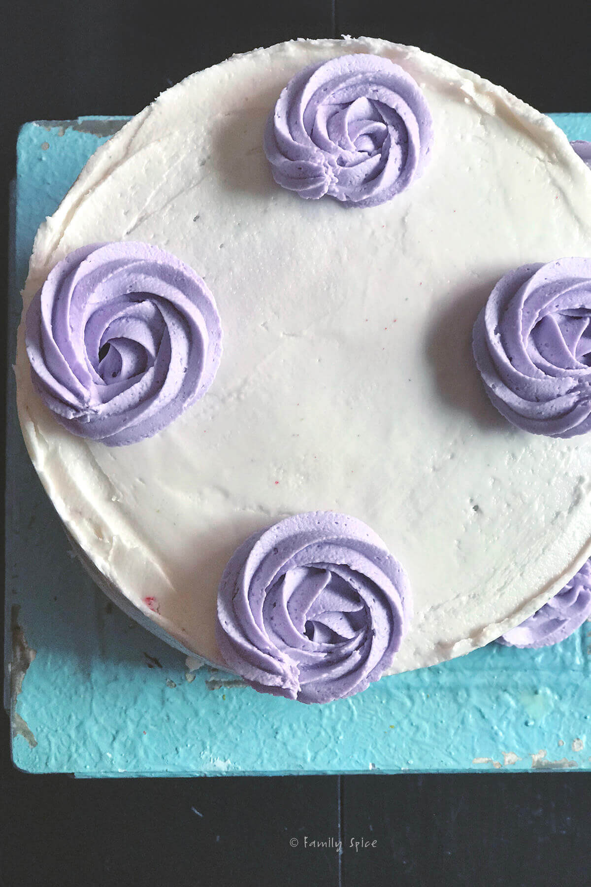 Piping purple swirls for the mane of my unicorn cake