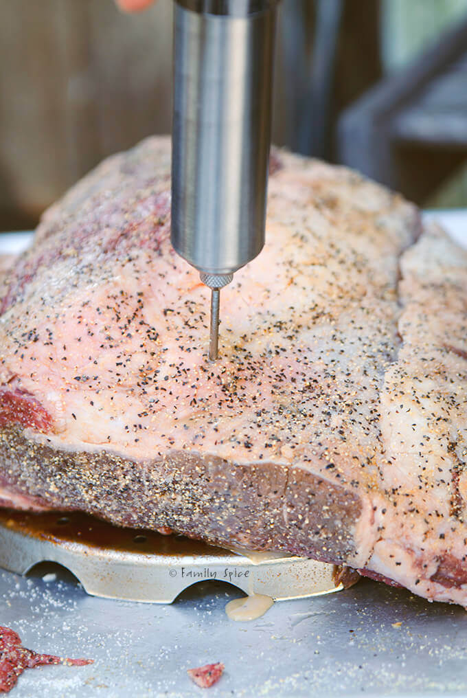 Injecting a rib roast with garlic butter by FamilySpice.com