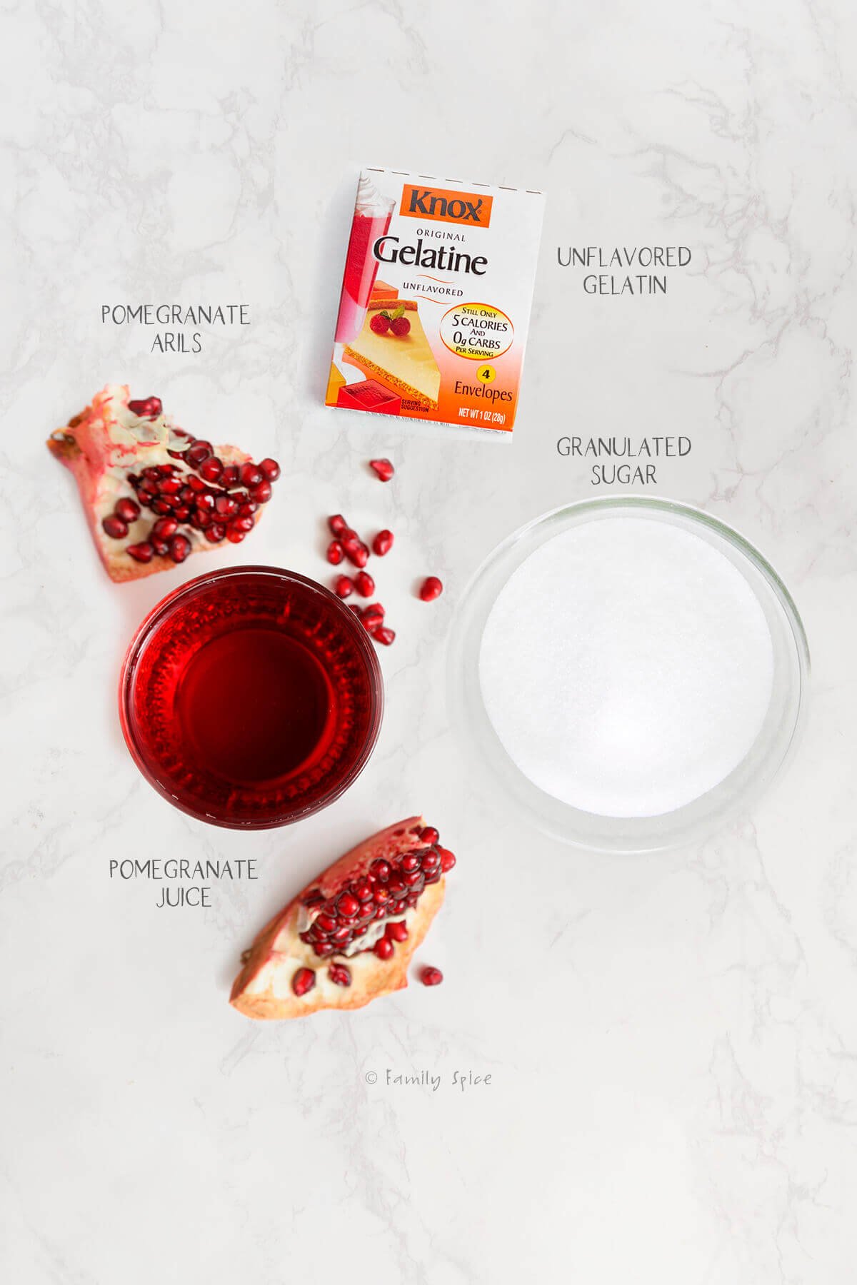 Ingredients labeled and needed to make pomegranate jello.