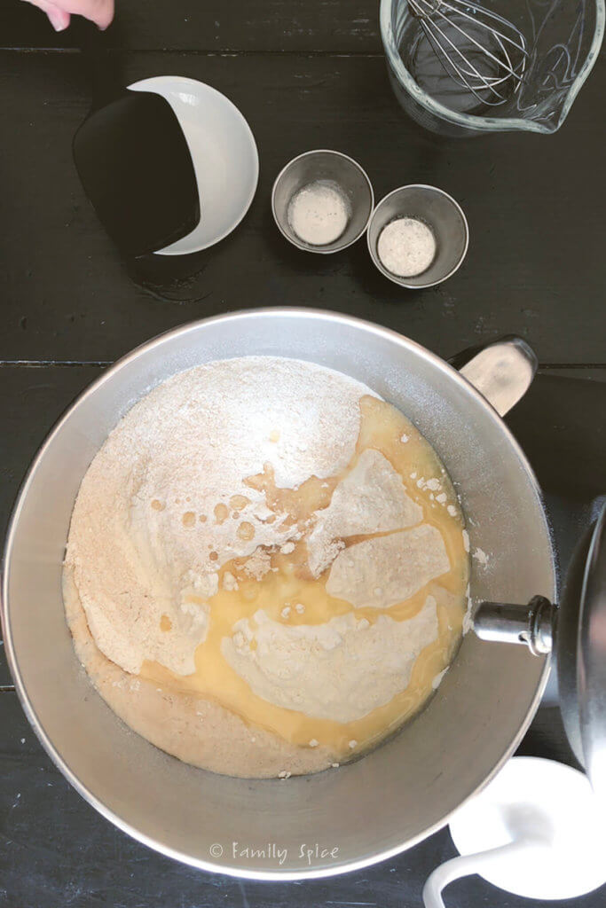 Flour added to yeast mixture to make pretzel dough