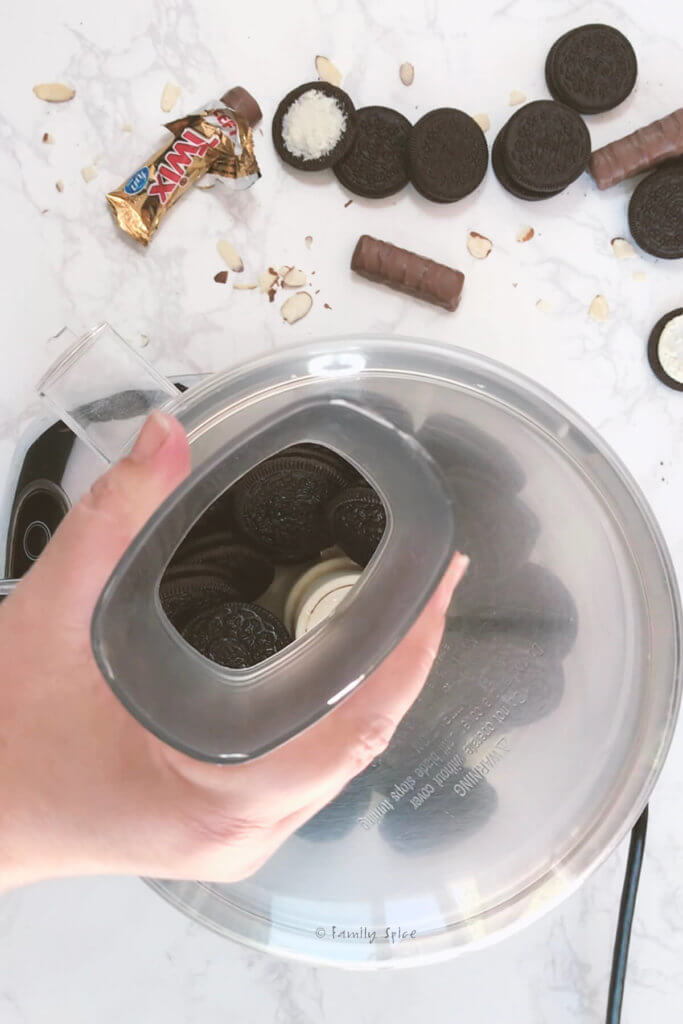 Oreos in a food processor with the lid on