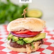 Pinterest image for queso stuffed burgers.