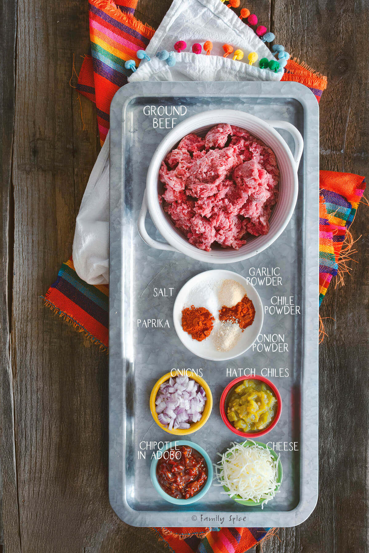 Ingredients labeled and needed to make queso stuffed burgers.