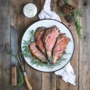 Overhead shot of Smoked Prime Rib Roast with Herb Garlic Crust and Horseradish Cream