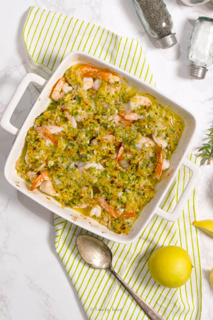 Closeup of baked shrimp scampi in a square baking dish