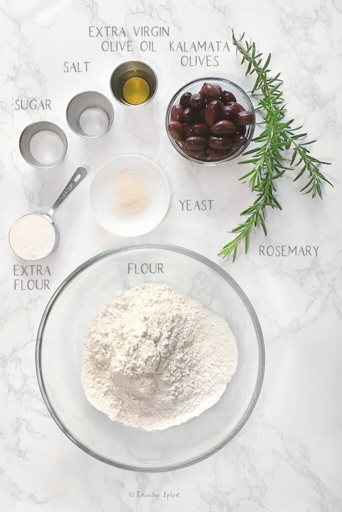 Ingredients labeled and needed to make kalamata olive bread