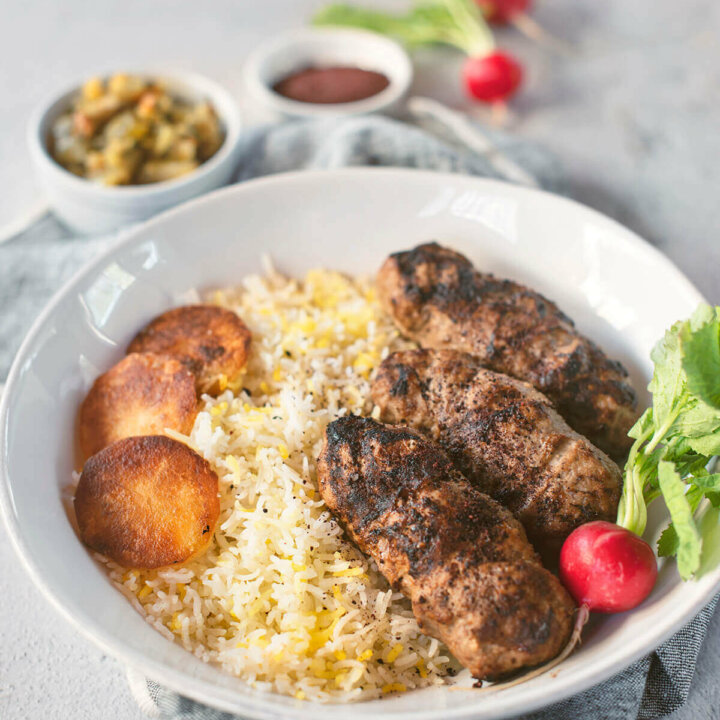 Persian koobideh kebab made in the air fryer over basmati rice with potato tadig and radishes