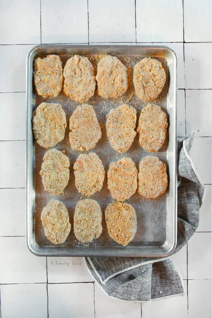Oval patties of ground turkey kotlet on a baking sheet ready to be cooked
